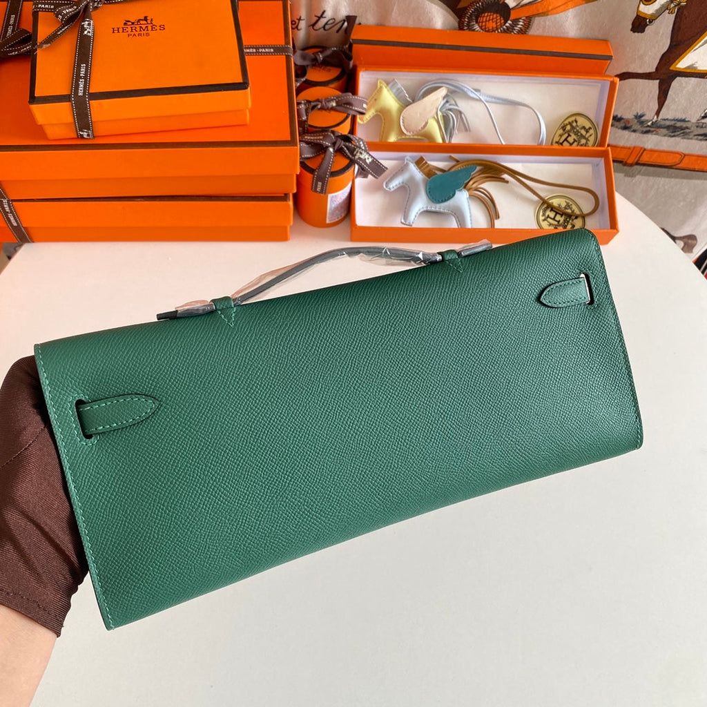 HERMES KELLY CUT 31 IN GREEN FOREST CALFSKIN WITH GOLD HARDWARE