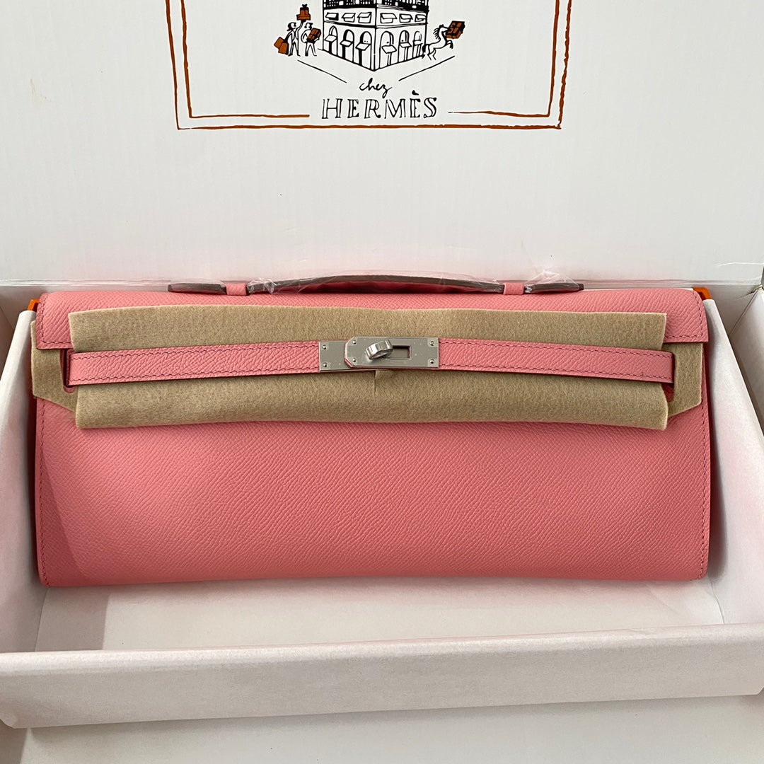 HERMES KELLY CUT 31 IN SALMON PINK CALFSKIN WITH SILVER HARDWARE