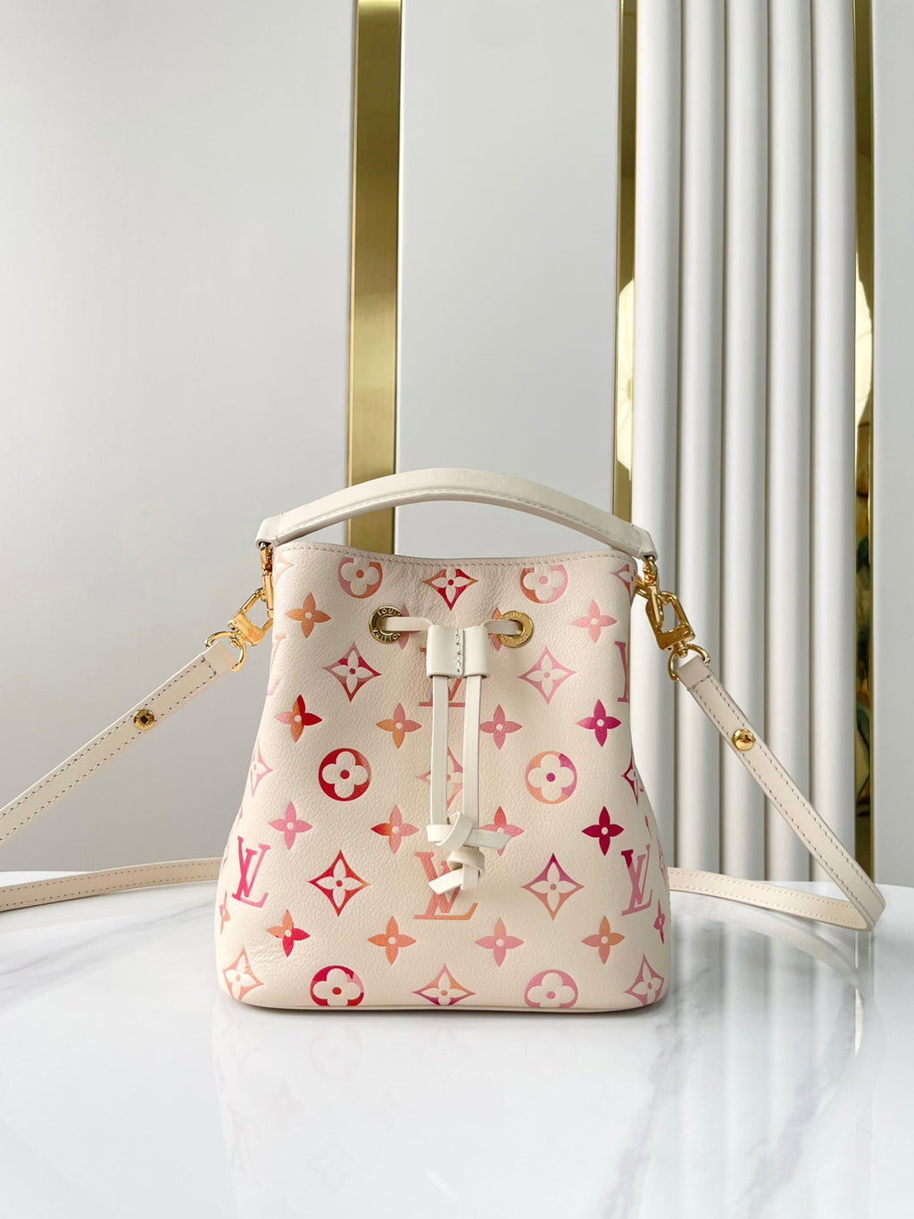 LOUIS VUITTON NÉONOÉ BB 20 IN SUNRISE AQUARELLE MONOGRAM EMPREINTE LEATHER