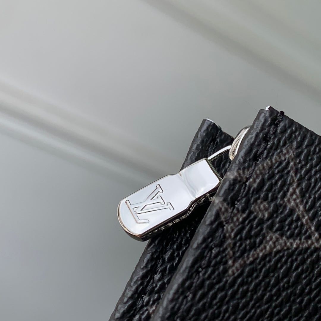 LOUIS VUITTON RIO TOILET POUCH 25 IN BLACK CANVAS MONOGRAM SILVER LOCK