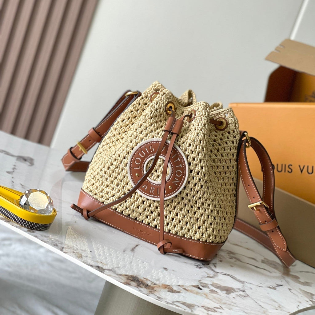 LOUIS VUITTON NOÉ PURSE 24 IN BEIGE CROCHETED RAFFIA AND BROWN CALFSKIN TRIM